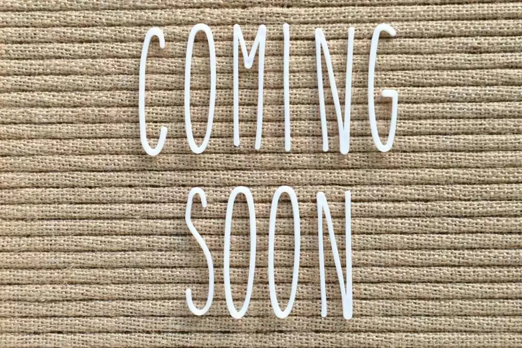 Coming Soon - white skinny letters on a burlap background, boho farmhouse chic style