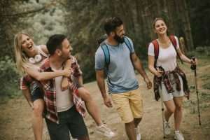 Group of young people are hiking in mountain