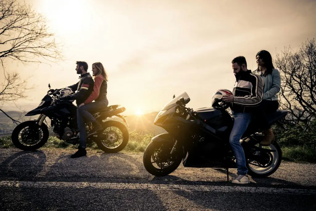 Two motorbikes driving in the nature