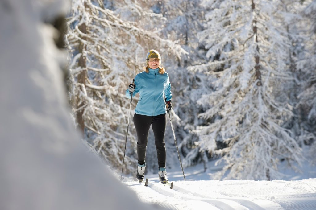 Austria, Tyrol, Seefeld, Woman cross country skiing