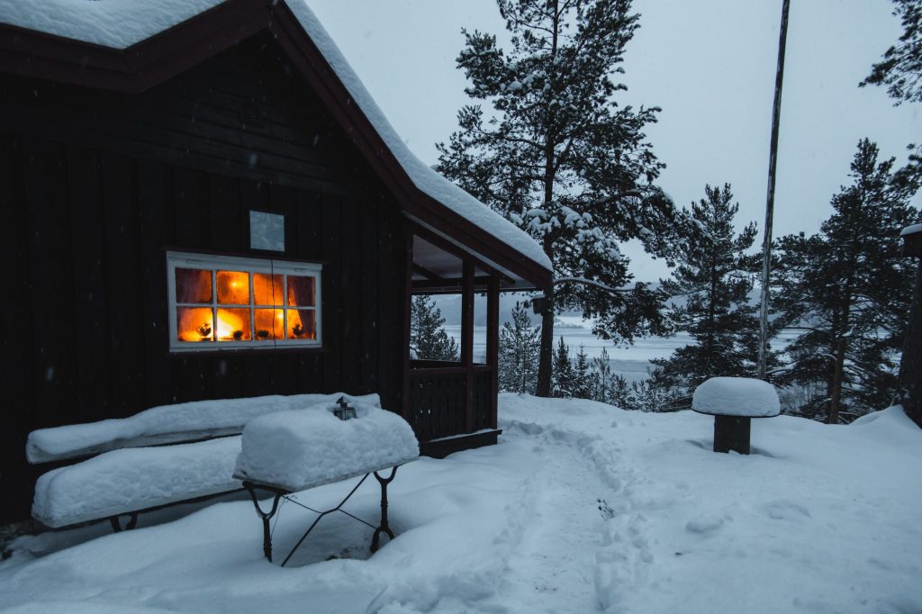 Cozy cottage in winter countryside